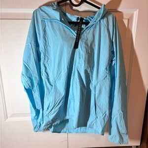 Blue Lululemon rain jacket